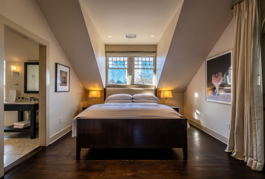 Master Suite bed with windows overlooking Atlanta