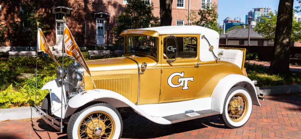 Old-fashioned gold car outside Georgia Tech